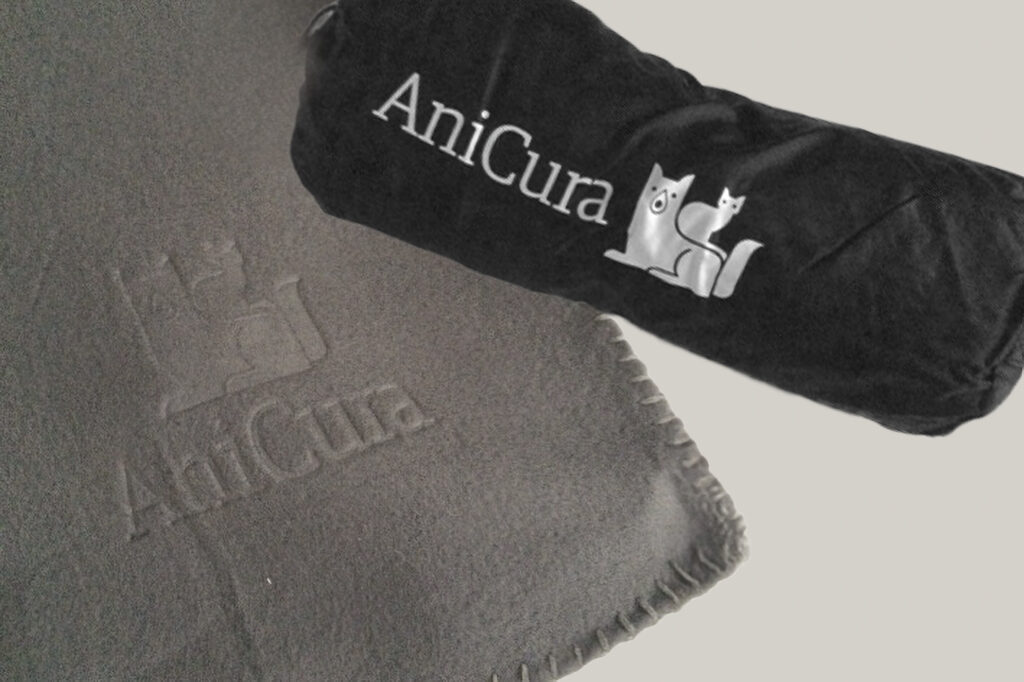 Anicura logo zoom in op de gepersonaliseerde materialen